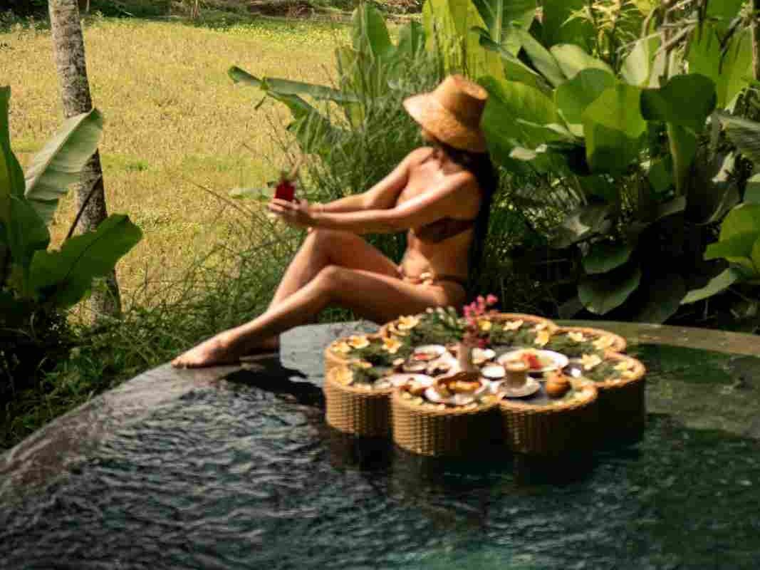 The floating breakfast at Equipoise Resort combines a delicious morning meal with the privacy of your own villa in Ubud.